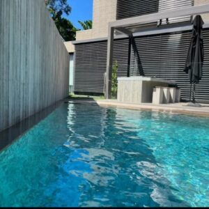 Luxury swimming pool with textured porcelain pool tiles Melbourne

 